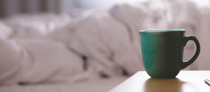 A coffee cup on a table.