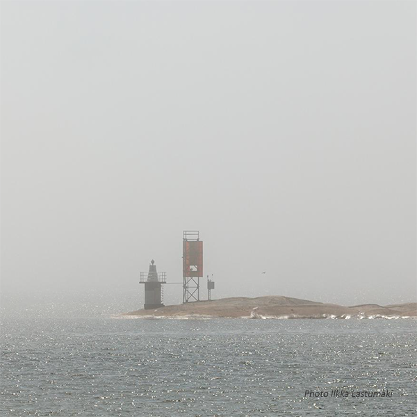 An island in a misty sea, also a link to the FINMARI Researcher Day 2023 web page