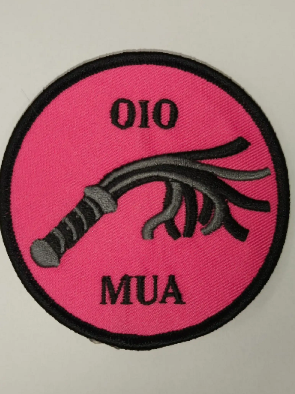 OIO mua haalarimerkki.