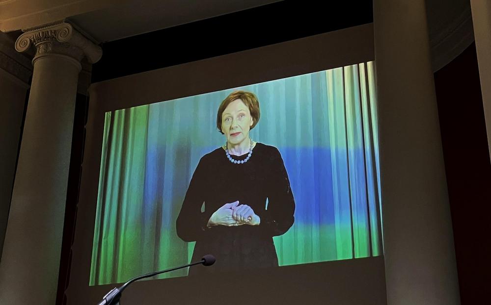 Suomen Kansallismuseon ylijohtajan Elina Anttilan tervehdys lähetettiin videonauhoituksena G18-juhlasaliin. Kuvaaja: Matti Heimonen.