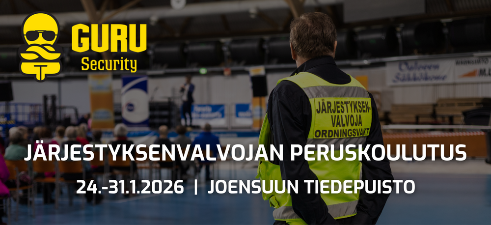 Järjestyksenvalvoja huomioliivit päällä.