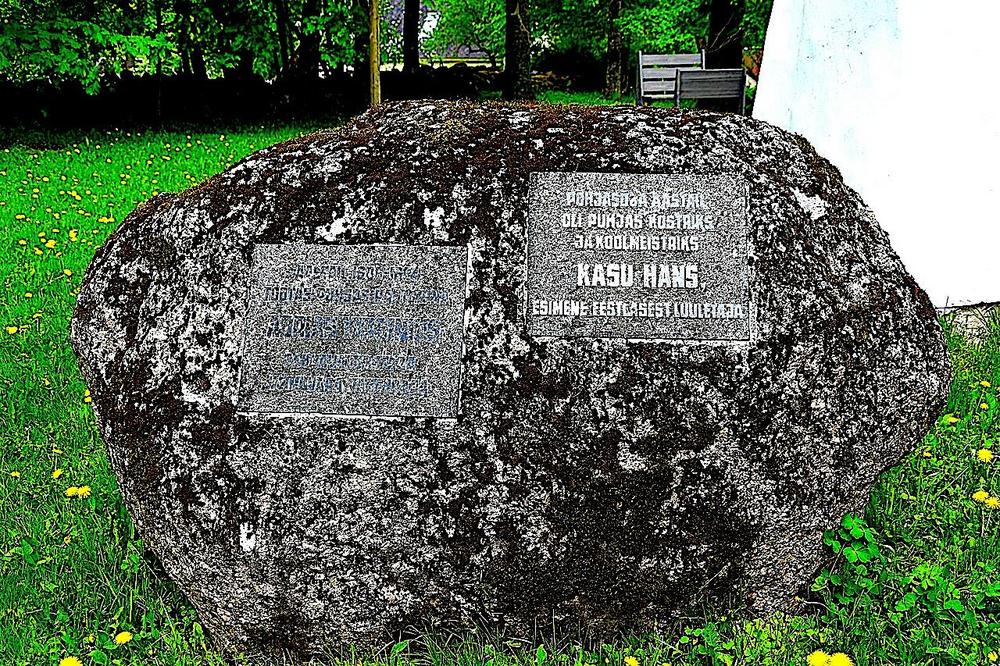 Käsu Hansin ja Adrian Virginiusin yhteinen muistokivi Puhjan kirkon vieressä. Kuva saatu puhjalaisilta.
