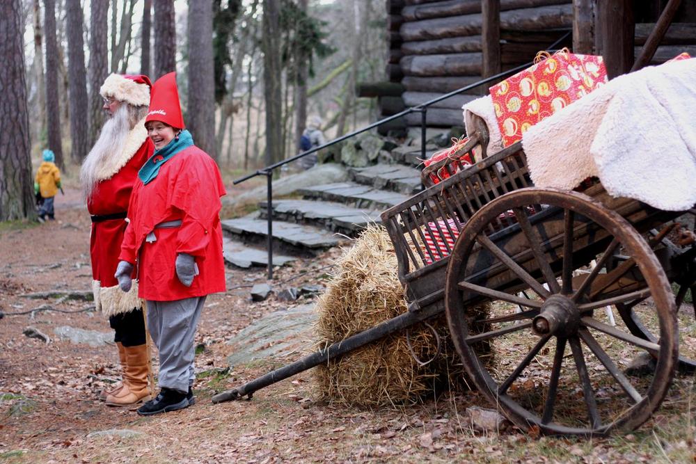 Father Christmas and Old Lady Christmas listen greet children