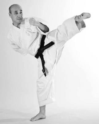 Karate instructor soshi Yuji Matsuoi demonstrates a sokutogeri kick.