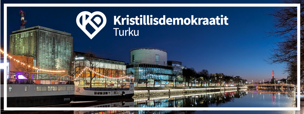 Kuva, jossa Turun uusi konserttitalo Fuuga kuvattuna Aurajoen toiselta puolelta syysiltana.